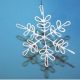 Snowflake made from string and fabric stiffener.