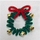 Easy pipe cleaner wreath craft to decorate packages.