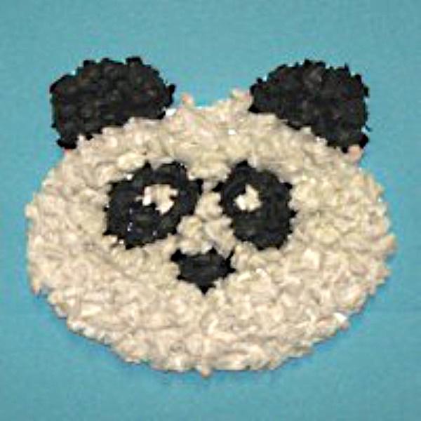 Panda made with small pieces of tissue paper