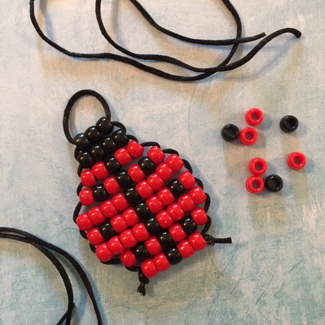 Ladybug made from pony beads.
