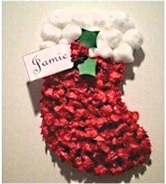 Crumpled tissue paper and white cotton balls make this stocking.