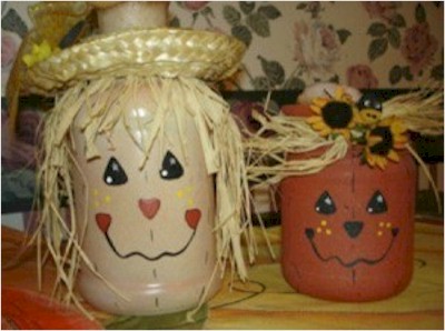 Decorative Scarecrow and pumpkin painted jars.